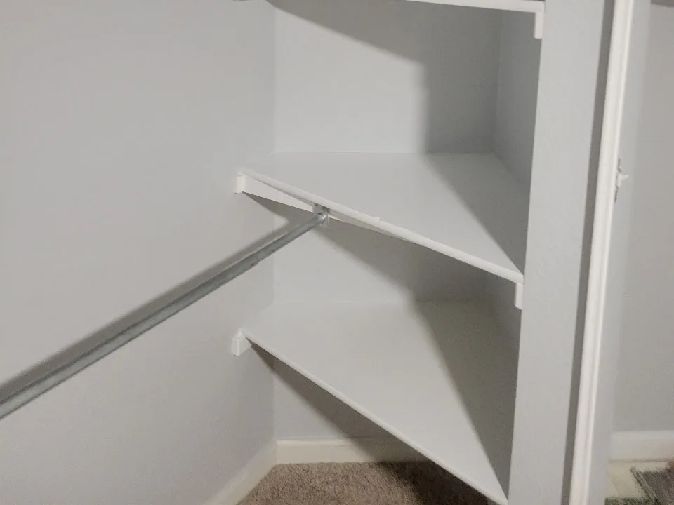 The same closet interior and shelving finished in bright white